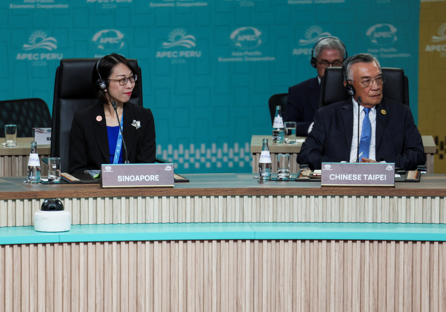 Taiwan s APEC representative invites Biden to visit island