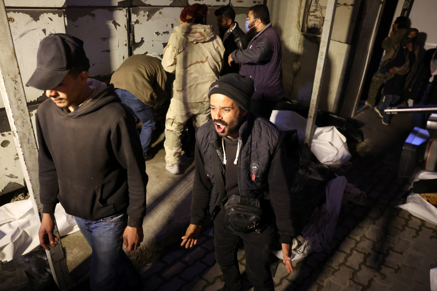 Syrians scour disfigured corpses for signs of detained loved ones
