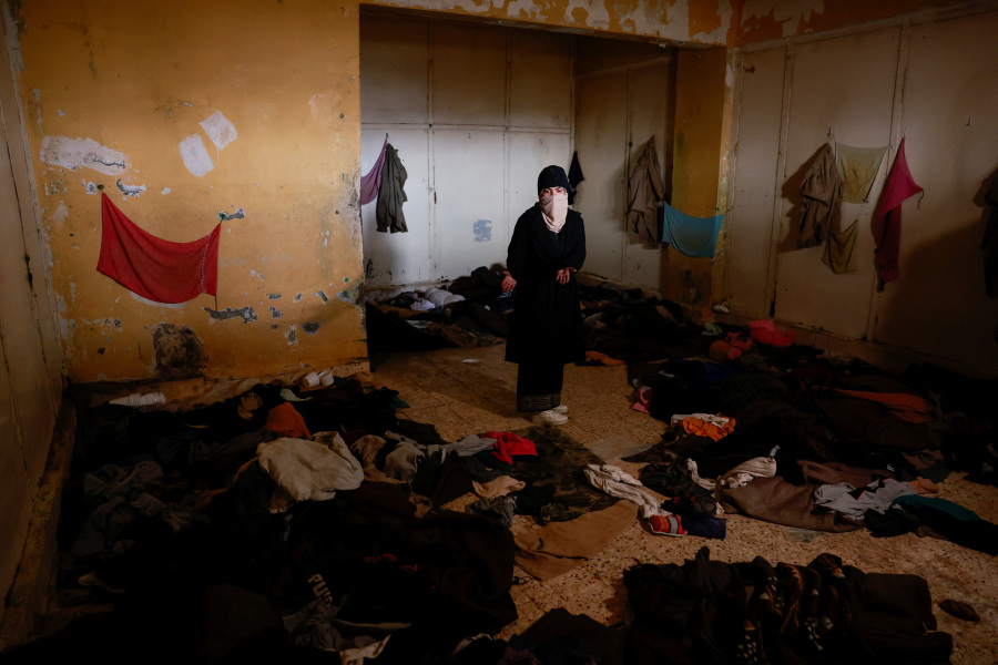 Syrian woman haunts Assad s notorious prison for clues of relatives fate