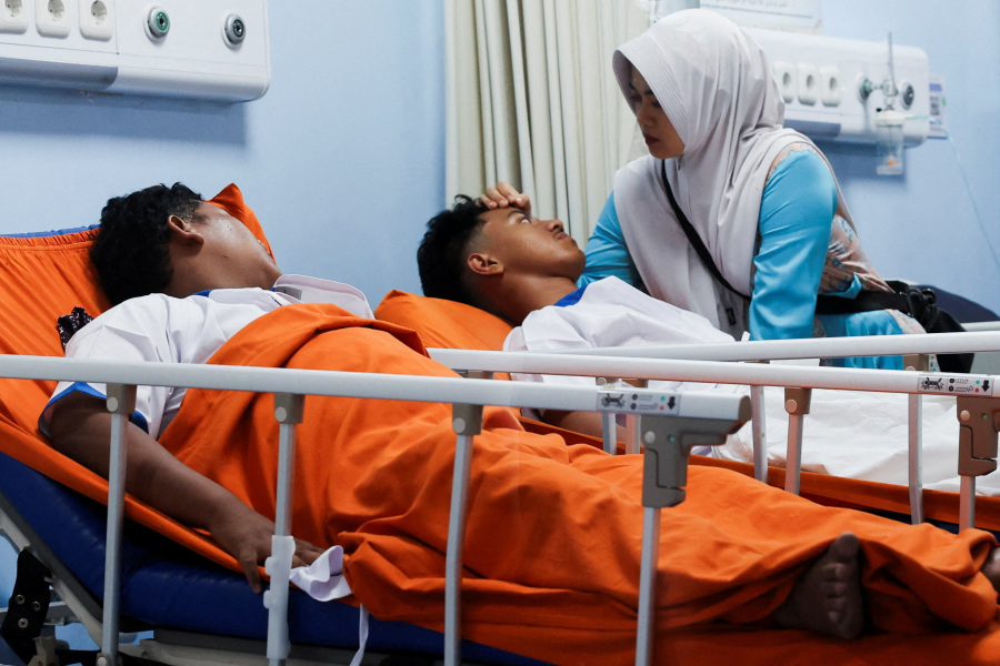 Blasts injure dozens at Indonesian mosque, student suspected
