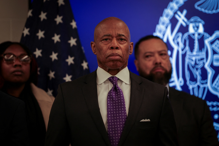 Judge declines to immediately dismiss Eric Adams corruption case, delays trial