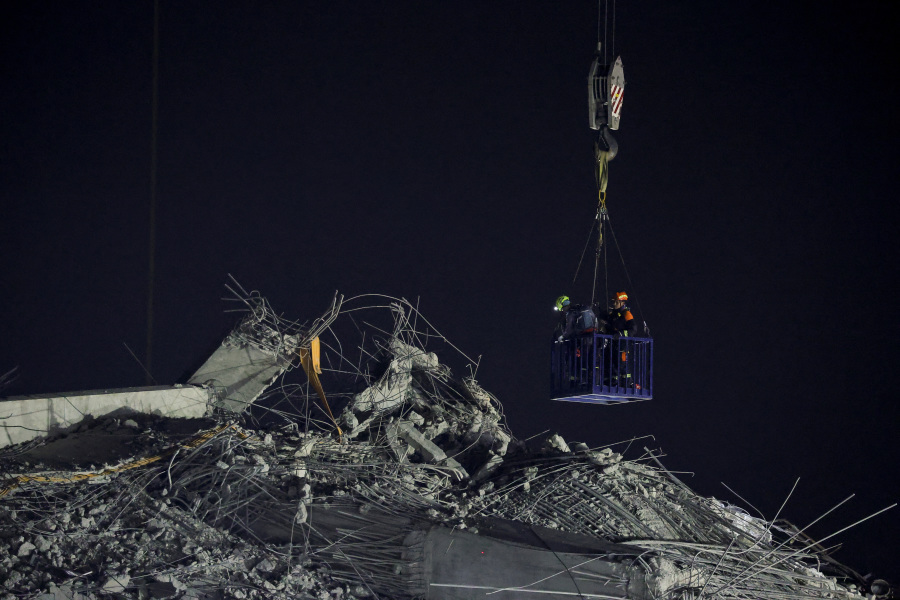 Woman pulled alive from Myanmar earthquake rubble; race to find more survivors