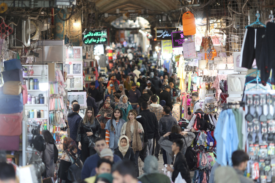 Anxious Iranians hope nuclear talks may ease risk of US attack