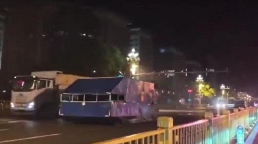 Something’s Happening in Beijing Online Footage Shows Camouflaged Tank Convoy Passing Through Chang’an Avenue at Night