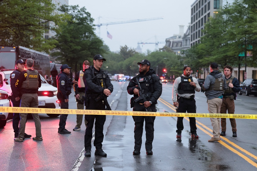 Suspect down after shooting at officers near White House, official says