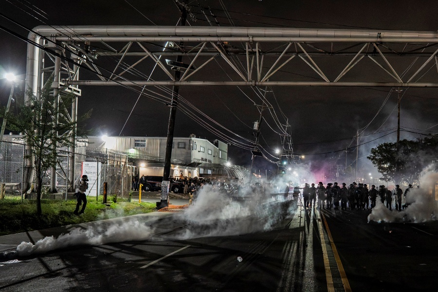New Jersey state police assert control outside migrant detention center