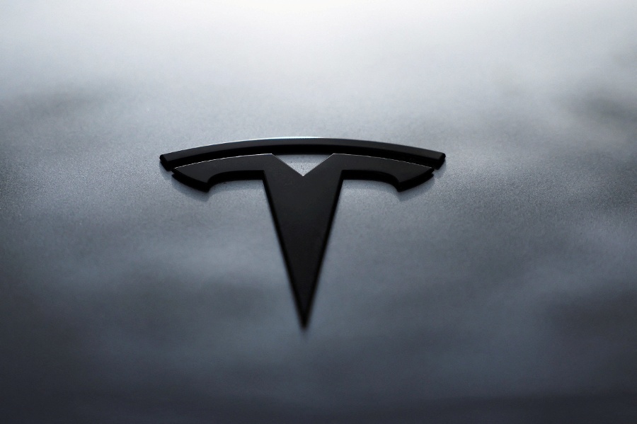 Tesla weighs sale of China business to pave way for potential SpaceX merger, WSJ reports