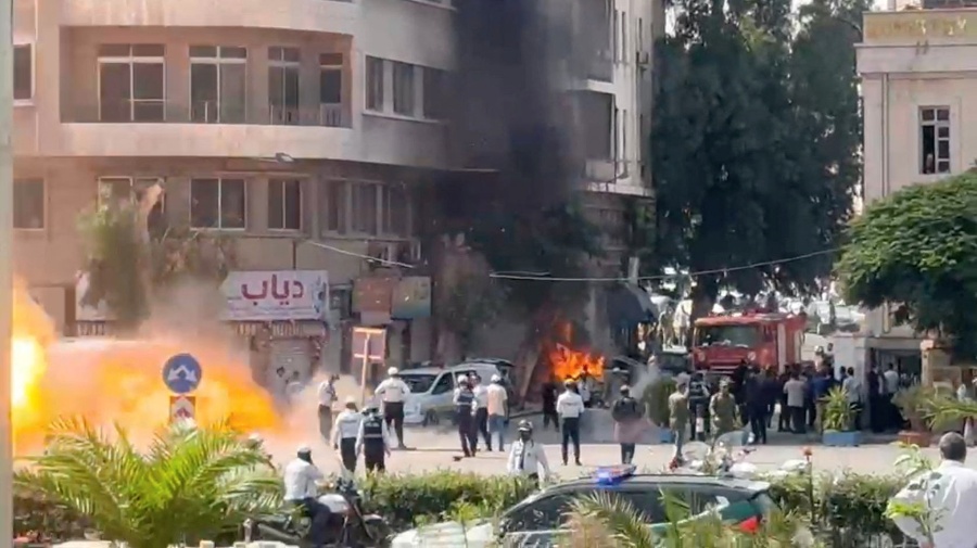 Explosions heard in Damascus during Macron visit, security source says