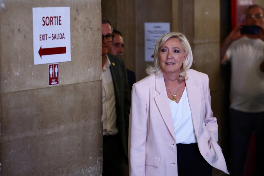 French court opens door to possible Le Pen presidential run, with ankle tag