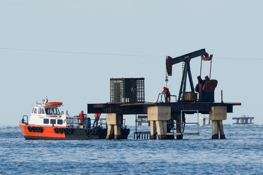 US oil firm to take over some Venezuelan oilfields previously run by Chinese, Russian companies, officials say